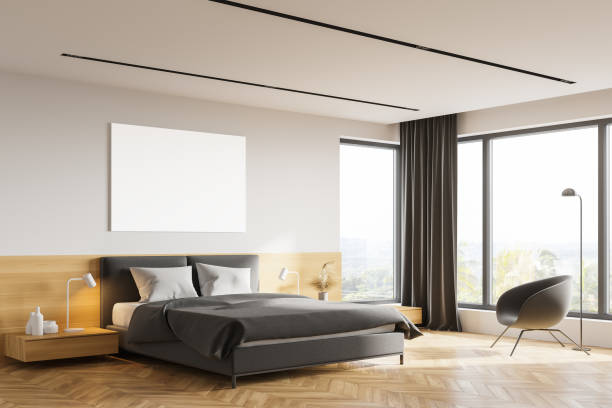 istock White and wooden master bedroom corner with poster 1249600055