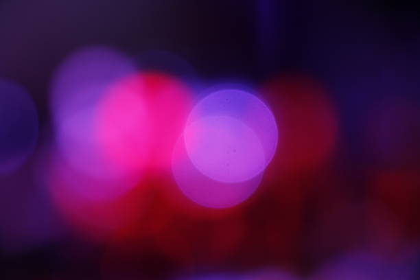 istock light and colorful bokeh lighting background, blur focus and circle lights 1249600118