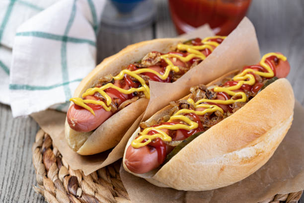 istock Barbecue Grilled Hot Dog with Yellow Mustard and ketchup 1249600607