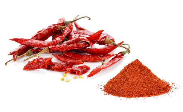 istock Powdered dried red pepper and red chili peppers 1249604328