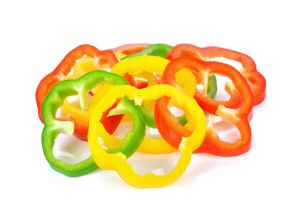 istock Sliced red yellow green pepper isolated on white 1249604400