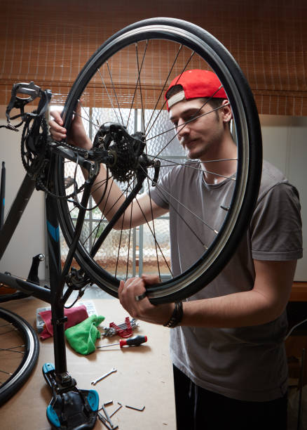 istock Man working on his bike. 1249606237