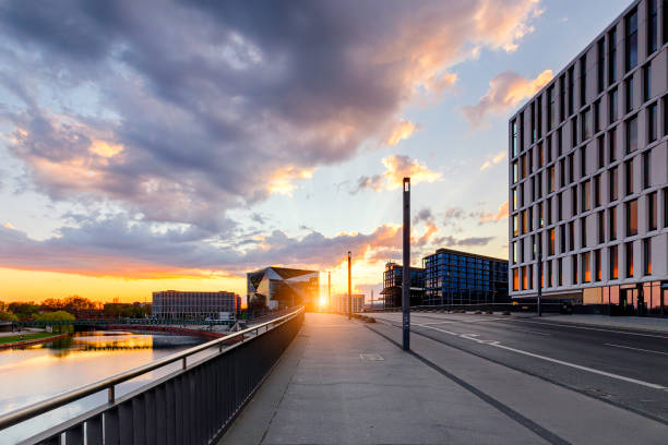 istock Berlin sunset office building with spree river 1249606538