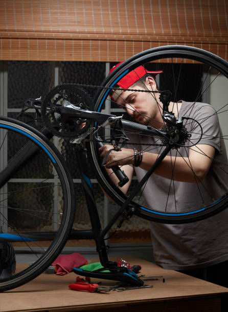 istock Man working on his bike. 1249606917