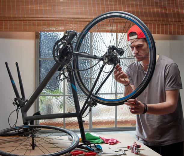 istock Man working on his bike. 1249608058
