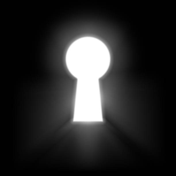 istock Keyhole illuminated rays of light isolated on black background. White keyhole symbol of hope or success. Vector 1249609875