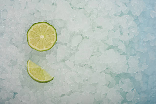 istock Fresh green lime cut slice over crushed ice 1249612089
