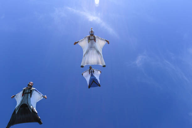 Group of paratroopers in blue sky