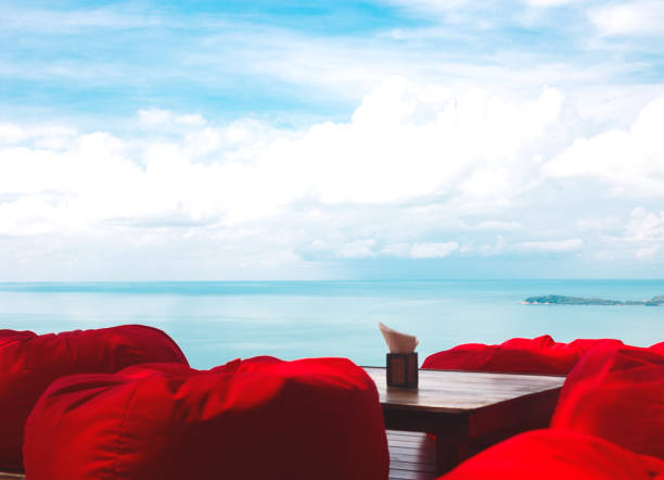 istock comfortable ottomans on top of a mountain with ocean views 1249616393