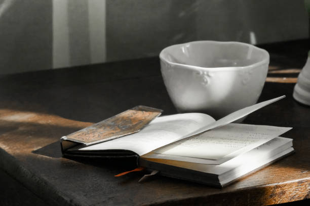 istock Tea cup on vintage table - stock photo 1249616612