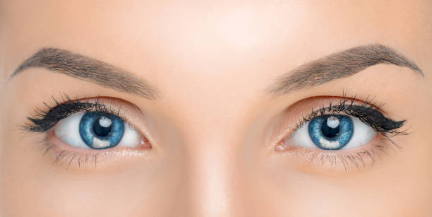 istock beautiful woman eyes with makeup close up 1249618715