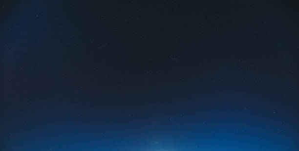 istock Night Starry Sky With Glowing Stars. Night Starry Sky Blue Background Backdrop 1249619011