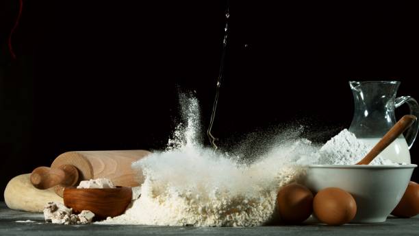 istock Freeze motion of falling yeast dough into flour 1249620582