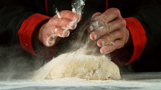istock Freeze motion of cooker processing dough 1249620741