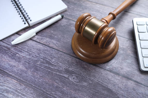 istock Top view of gavel, notepad and keyboard on table 1249623126