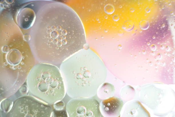 istock bubbles oil drops on the water surface 1249623329
