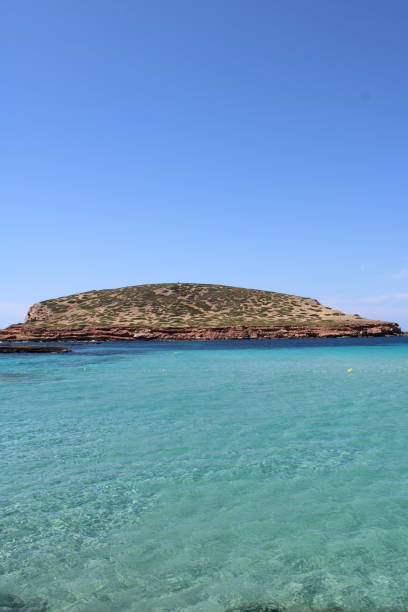 istock Blue sky and crystal clear water 1249627464