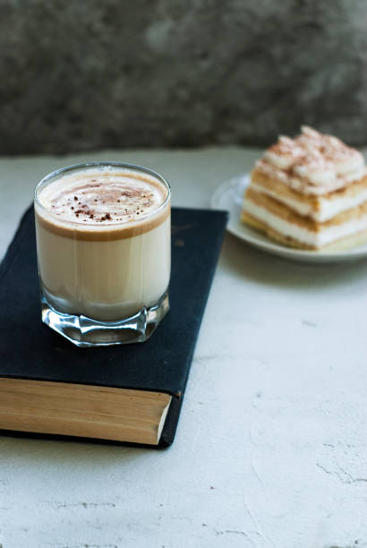 istock Dalgona coffee and tiramisu dessert on a gray background.Top view. 1249628362
