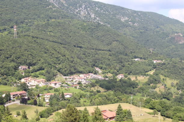 istock village in the mountains in Italy 1249637982