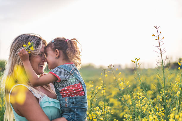 istock Young mother and daughter enjoying nature 1249639688