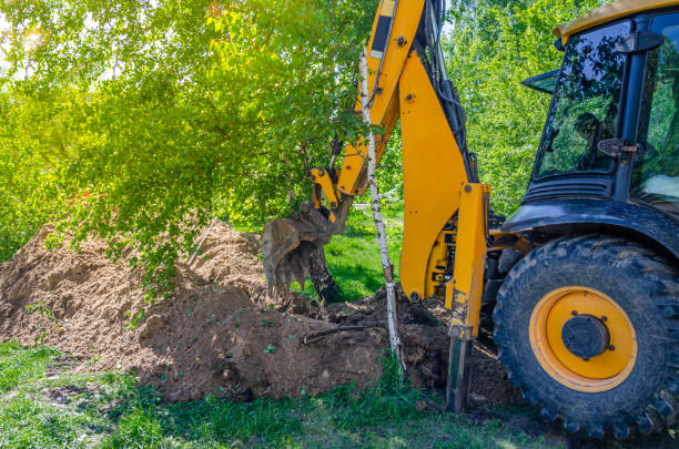 istock A wheeled universal excavator digs a trench 1249641487