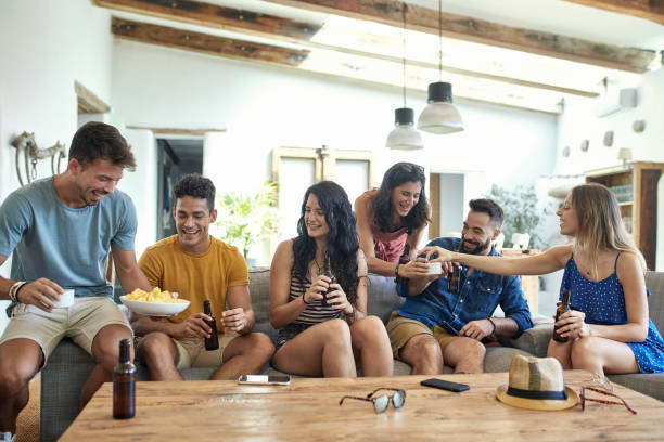 istock Friends Serving Snacks at Casual Summer Social Gathering 1249641785