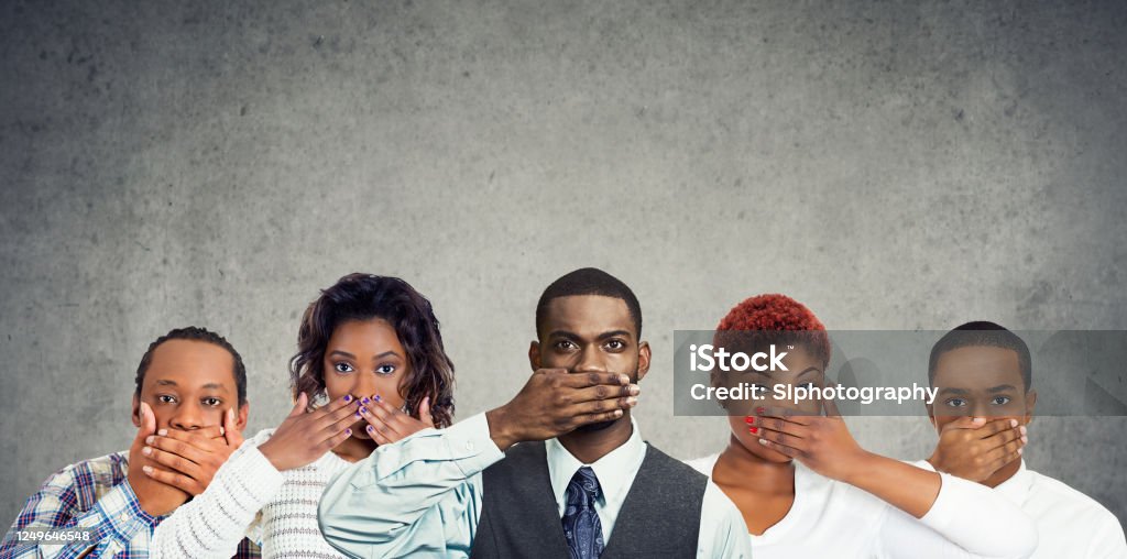 Group of black men and women protesting in silence Group of black men and women with hand to mouth gesture, protesting in silence Community Stock Photo