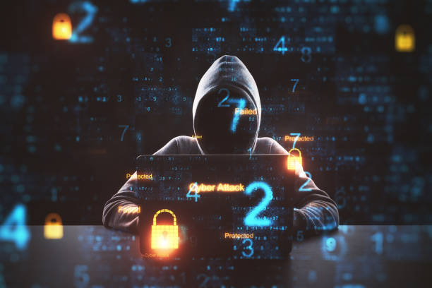 Cyber attack in process with hacker stock photo