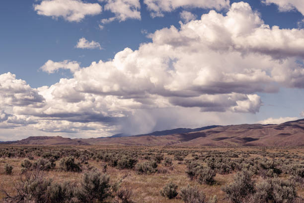 istock Summer high desert mountain landscape with blue sky and clouds 1249654259