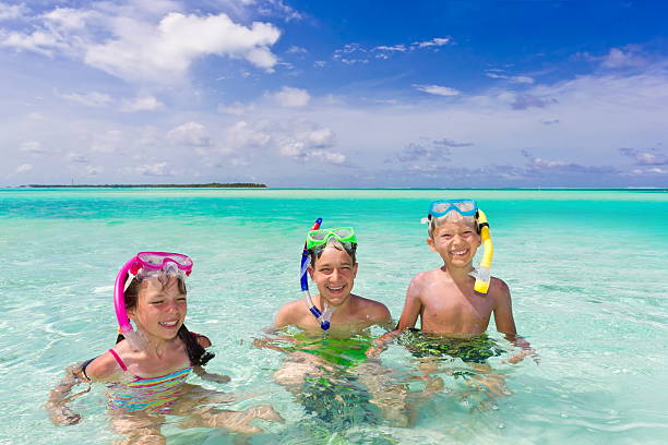 istock Children snorkeling in sea 124965662
