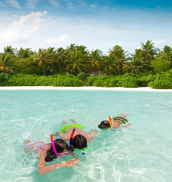istock Children snorkeling in sea 124965685