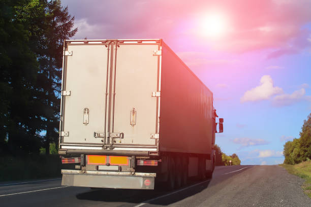 istock truck moves on highway 1249660939