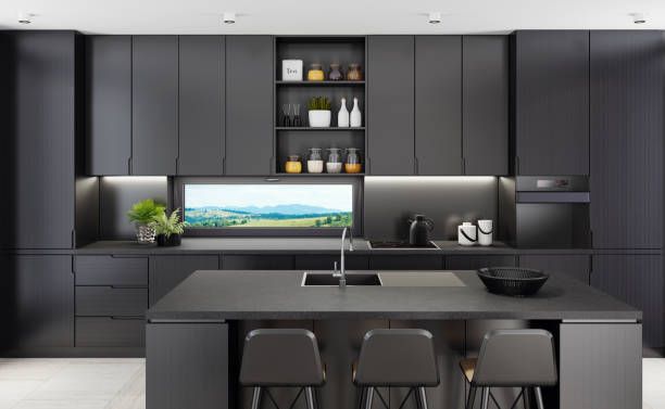 istock Luxurious matte black kitchen with island table at country side background 1249662745