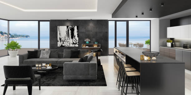 istock Luxury black interior living room with modern minimalist Italian style open space kitchen with big long kitchen island. 1249664629