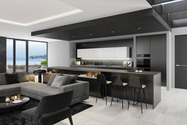 istock Luxury black interior living room with modern minimalist Italian style open space kitchen with big long kitchen island. 1249664724