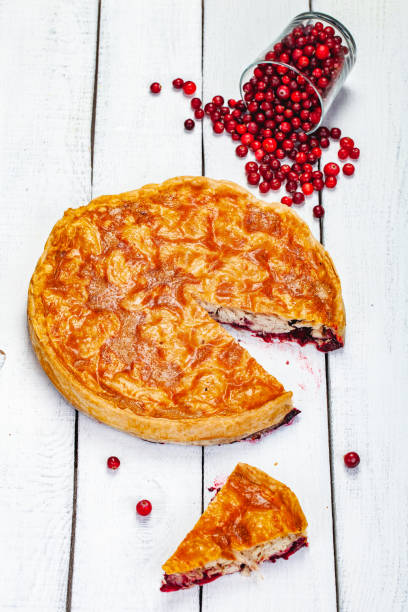 istock Christmas pie with turkey and cranberry. Close up 1249667406
