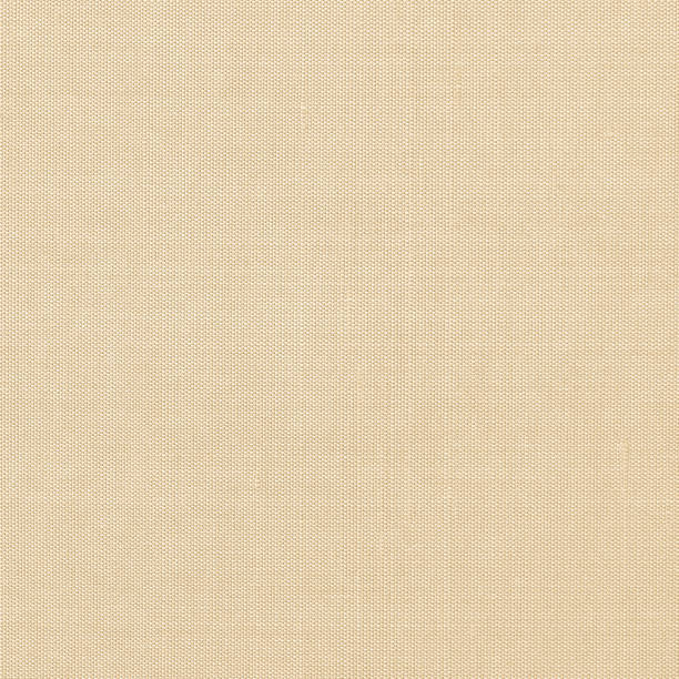 istock Cotton silk natural blended fabric wallpaper texture pattern background in light pastel pale cream gold brown color 1249667419