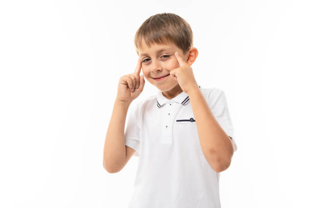 istock A little blonde boy think about it, picture isolated on white background 1249667638