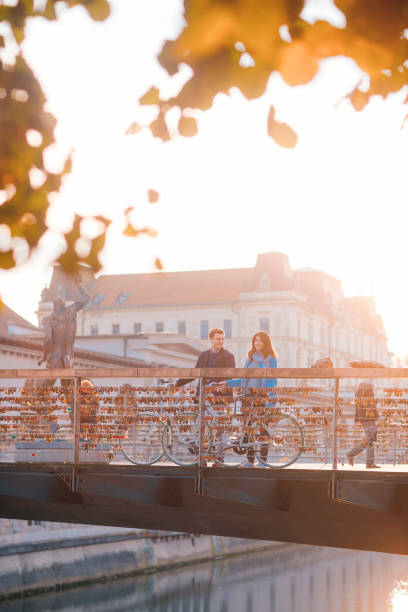 istock Romantic Sightseeing: Couple in Love Standing on a Bridge 1249667794