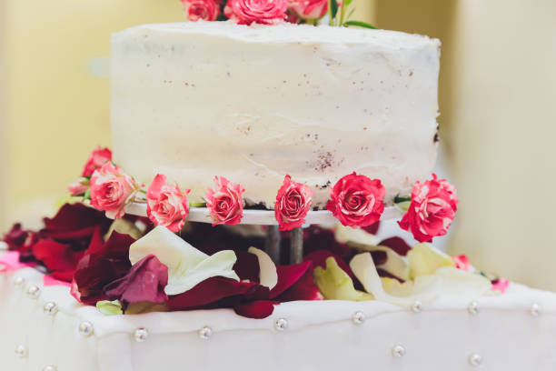 istock White Cream Icing Cake with Fruits and Chocolate. 1249670915