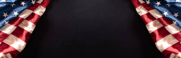 istock Happy Independence Day. American flags against a black  background. July 4. 1249674790
