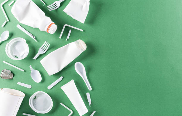 Top view of Different garbage materials on green pastel background. Recycle, World Environment Day, go green and Eco concept