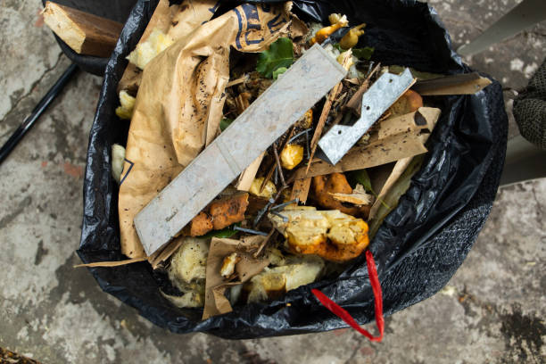 istock black garbage bag full of construction debris and trash at a construction site 1249686997