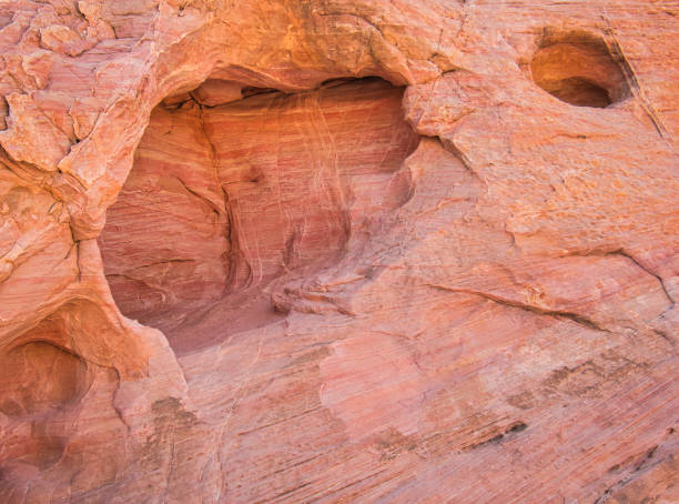 istock A reddish rock with lines and white scars 1249689842