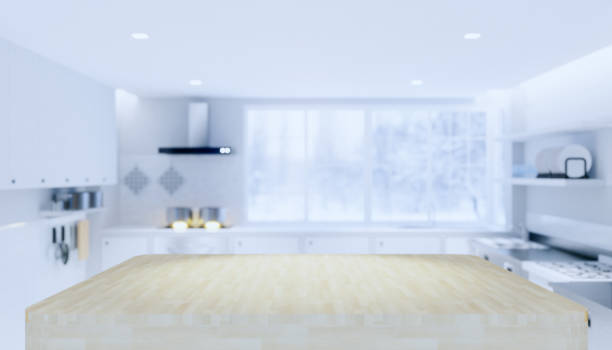 istock Wood countertop product display and blurred kitchen background. 1249692833