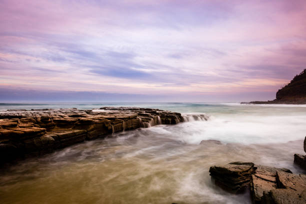 istock Rock and Wave in Little Garie Beach 1249706938