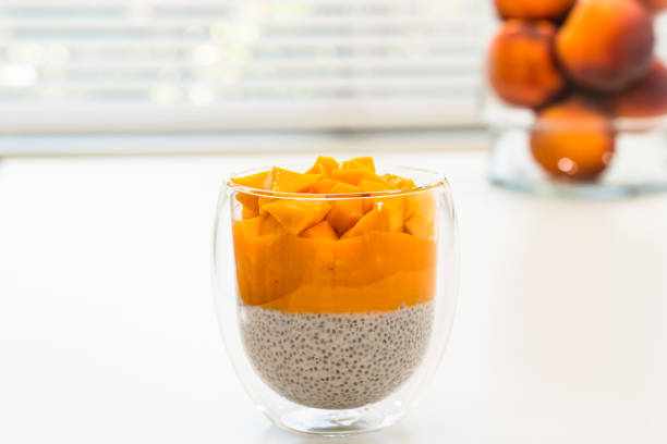 Glass of Chia seed pudding with fresh peach