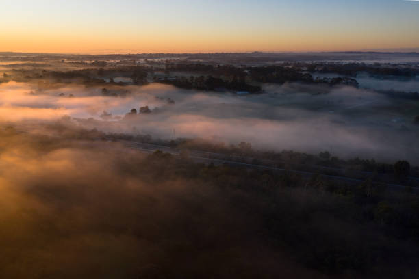 istock Early Morning Fog on Sunrise 1249708488