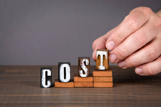 istock COST concept. Wooden alphabet letters on steps 1249711830