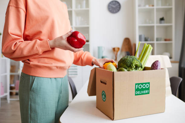 istock Woman getting the fresh vegetables 1249716768